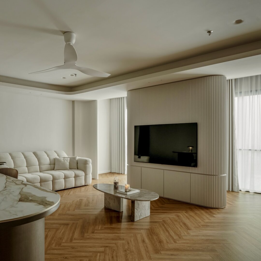 A cream Son&Bear sofa on herringbone floors in a customer's living room